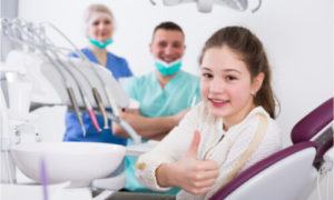 The child visits her dentist regularly.